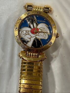 Vintage Collectible Armitron Sylvester The Cat Loonie Toons Gold Tone Watch.